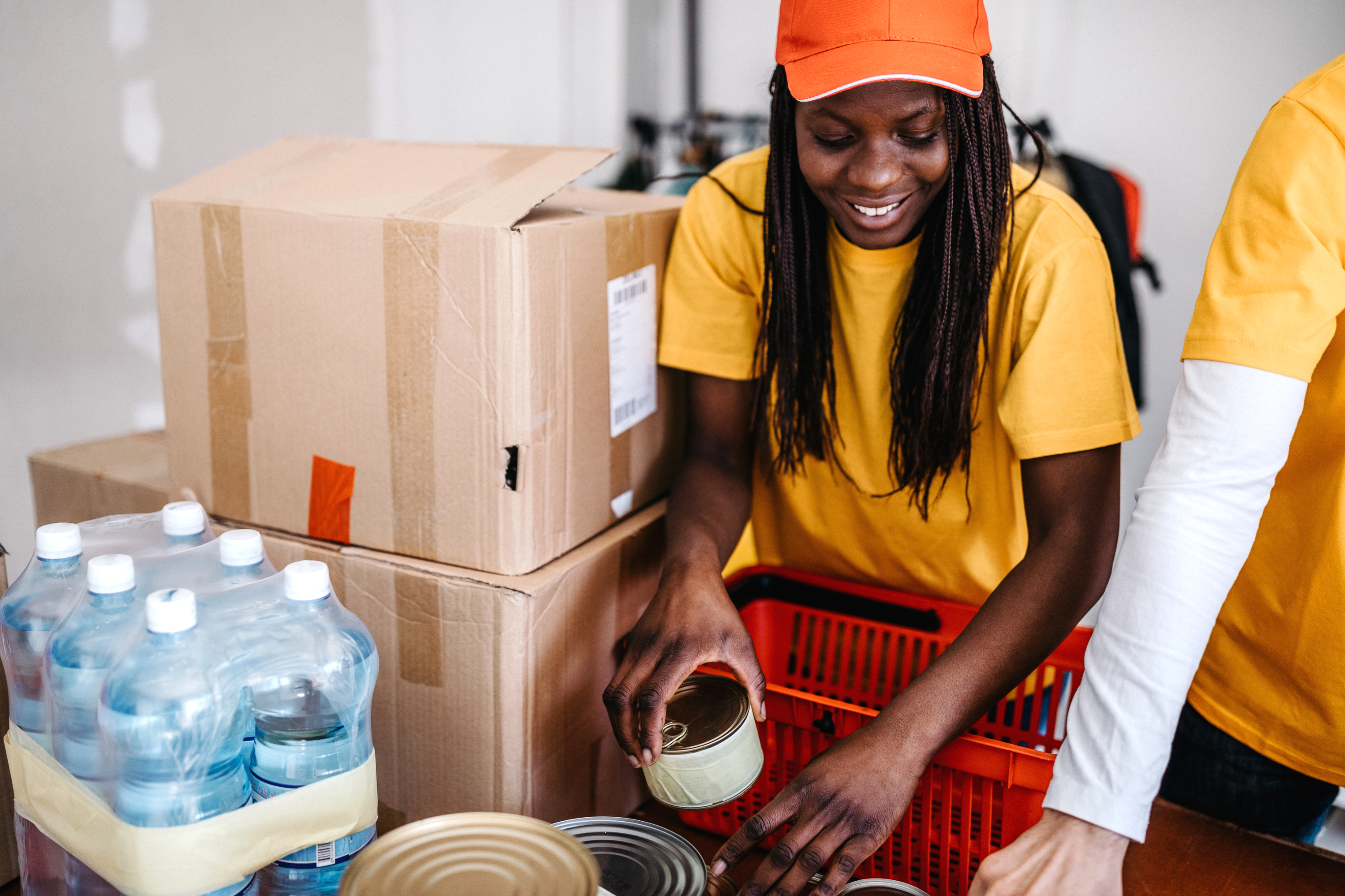 A person stacking boxes